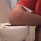A woman with a tattoo on her back takes a shit into a toilet in several scenes with some nice angles. Over 7.5 minutes.